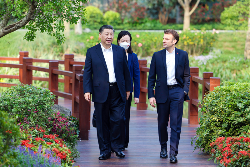 习近平同法国总统马克龙在广州非正式会晤